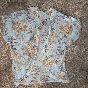 Boutique kimono. Sheer material with floral design. Like new condition .